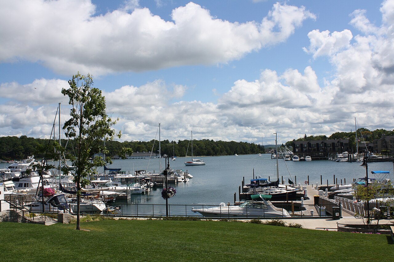 Charlevoix harbor on Lake Charlevoix with boats and waterfront